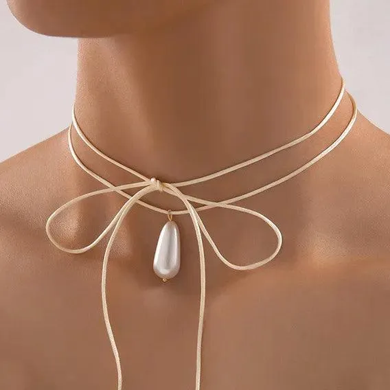 Elegant Black Ribbon Choker Necklace with White Pearls: Timeless Elegance