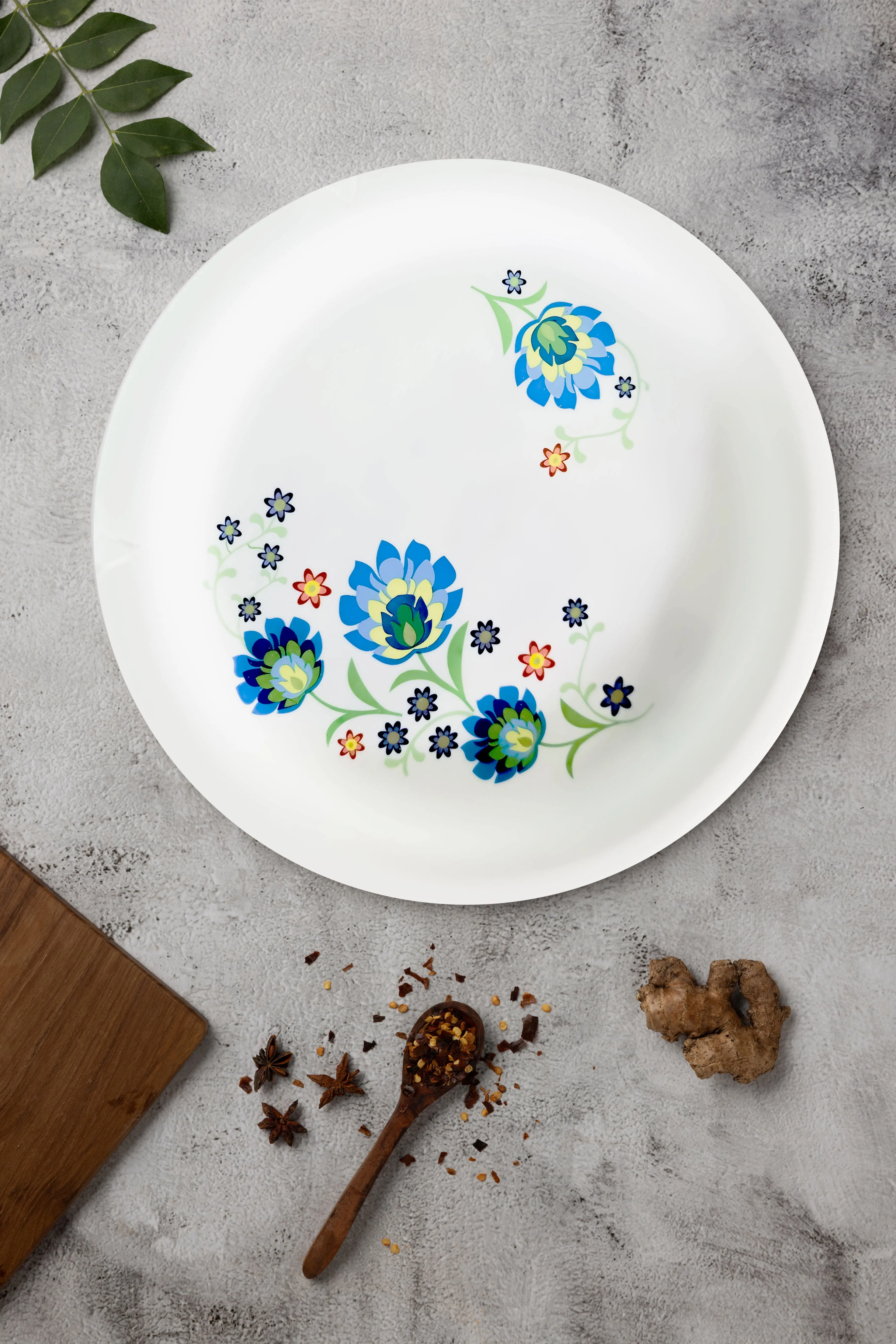 Elevate your dining experience with our Blue Floral Plate collection. They are crafted from durable plastic.