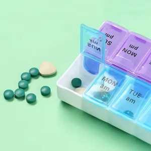 Portable 14 Compartment Pill Box for Daily Medication Management